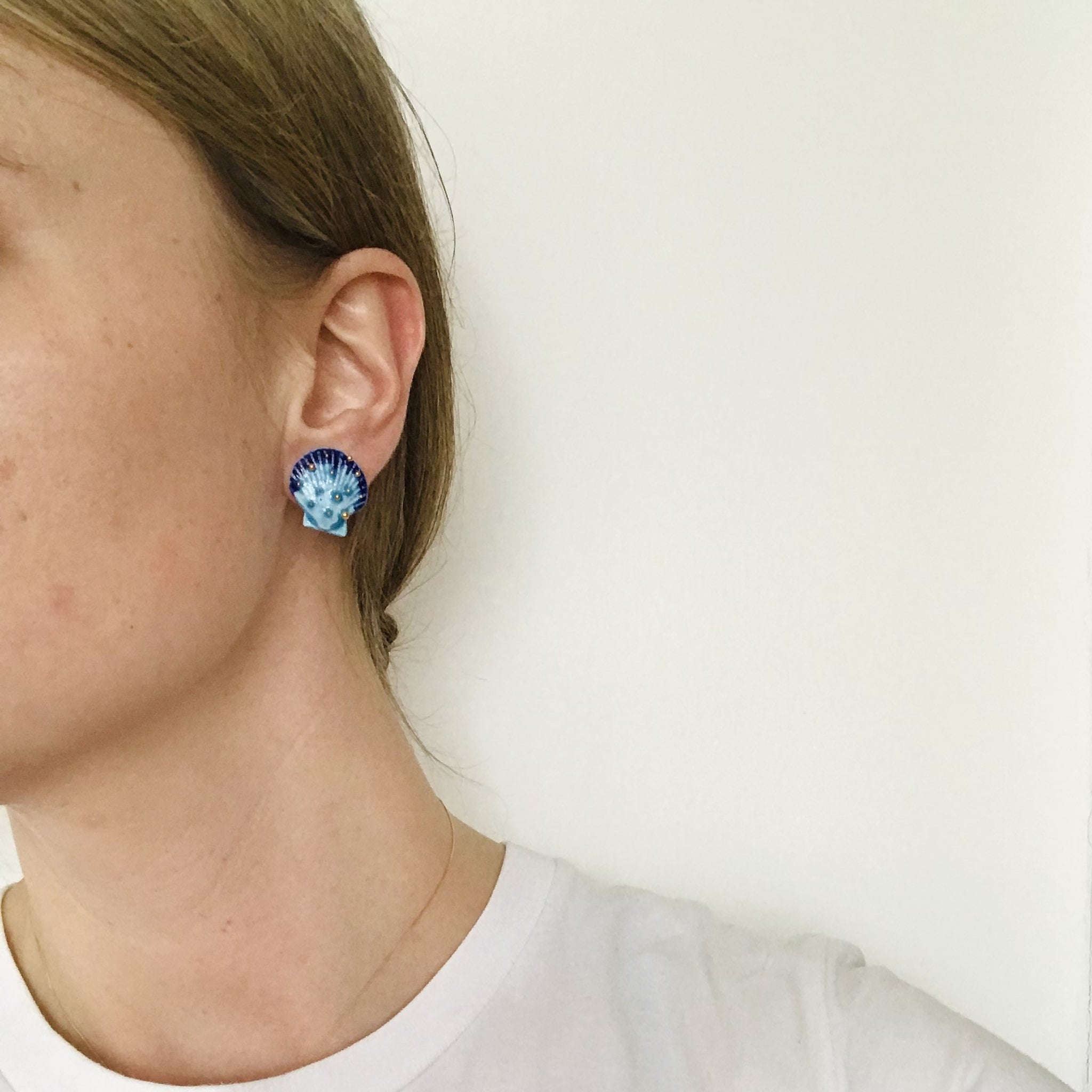 Bea_wearing_blue_seashell_earrings-min.jpg