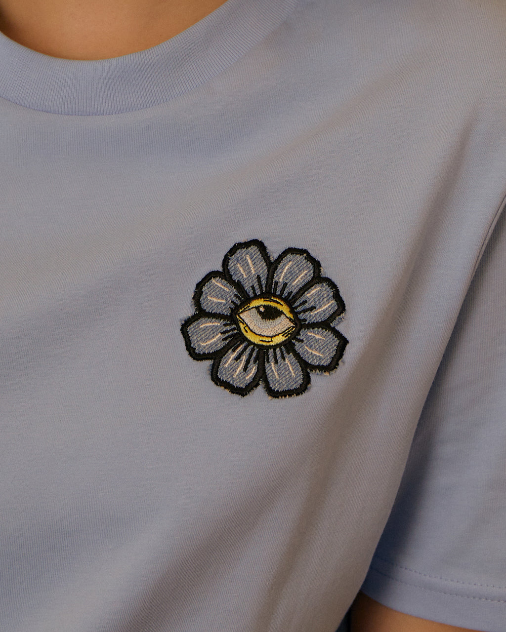 Blue Eyed Flower Upcycled Appliqué T-Shirt Blue