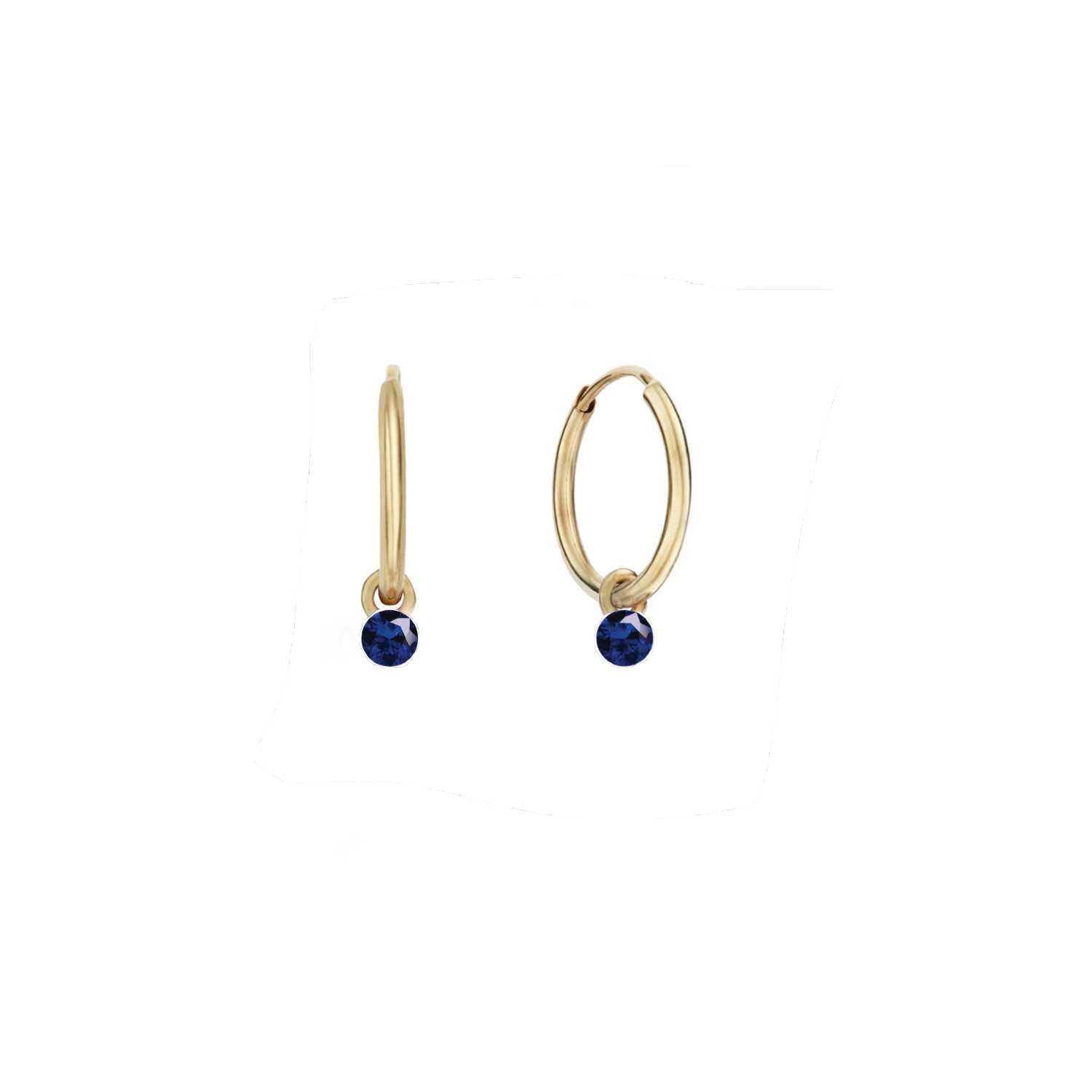 Rising Star Blue Sapphire Huggie Hoops