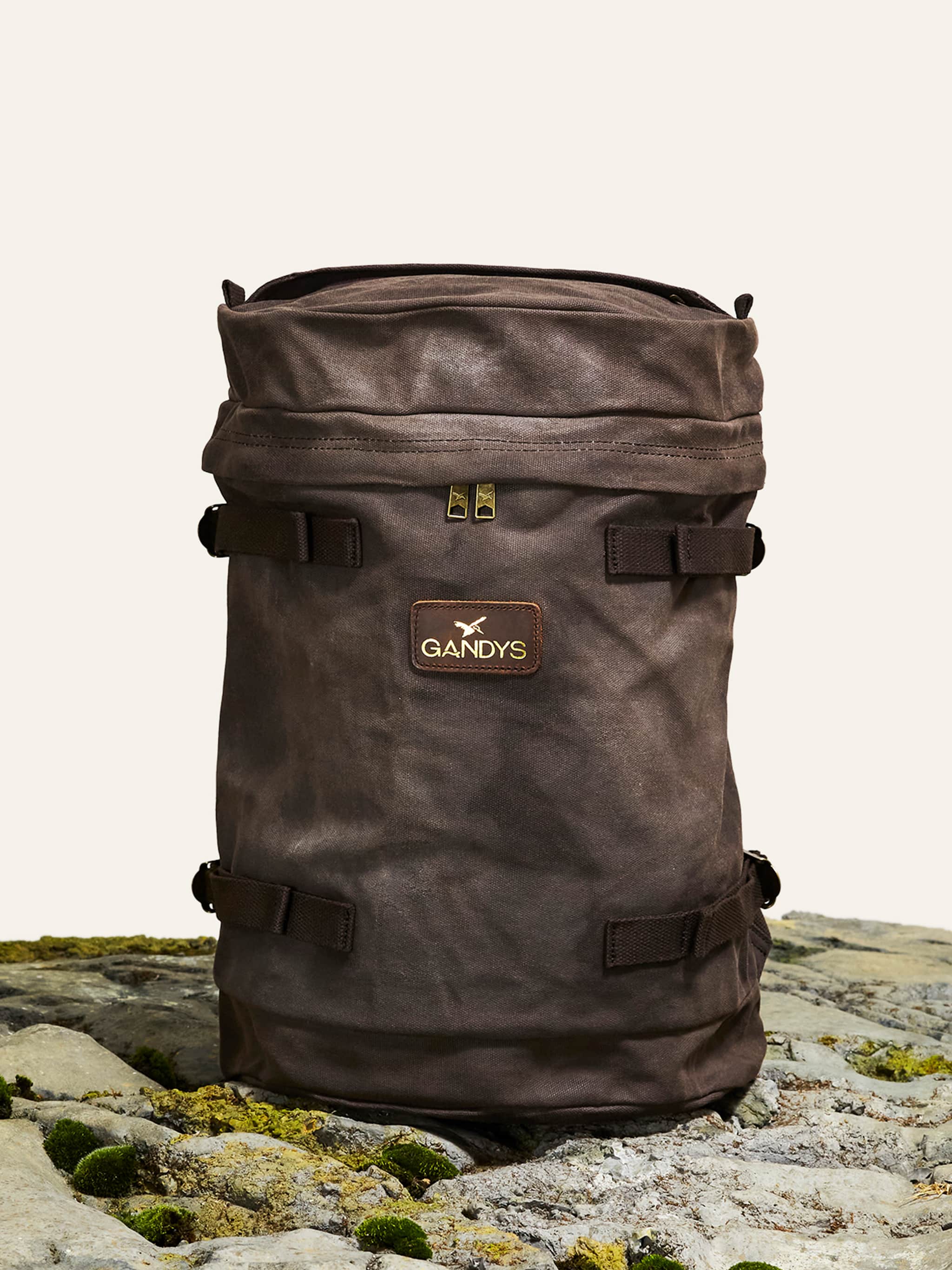 chestnut-brown-waxed-navigator-trek-backpack-599240_7fb6ca90-f478-4f65-81f7-46d84e2a7b93.jpg